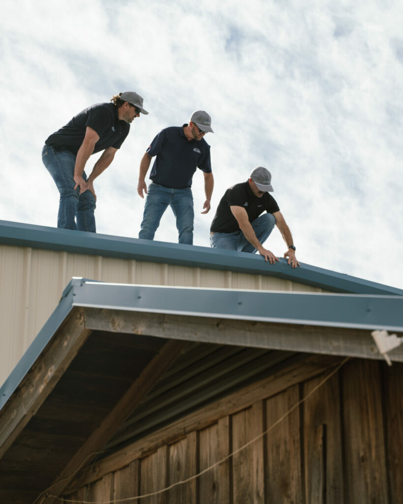 West Texas Commercial Roofers Inspecting a Roof Before Repair