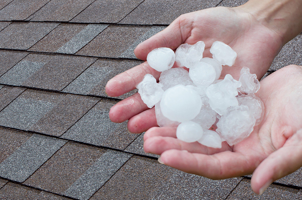 https://www.iko.com/blog/wp-content/uploads/sites/10/2023/07/hail-roof-shingles.jpg?utm_source=chatgpt.com
